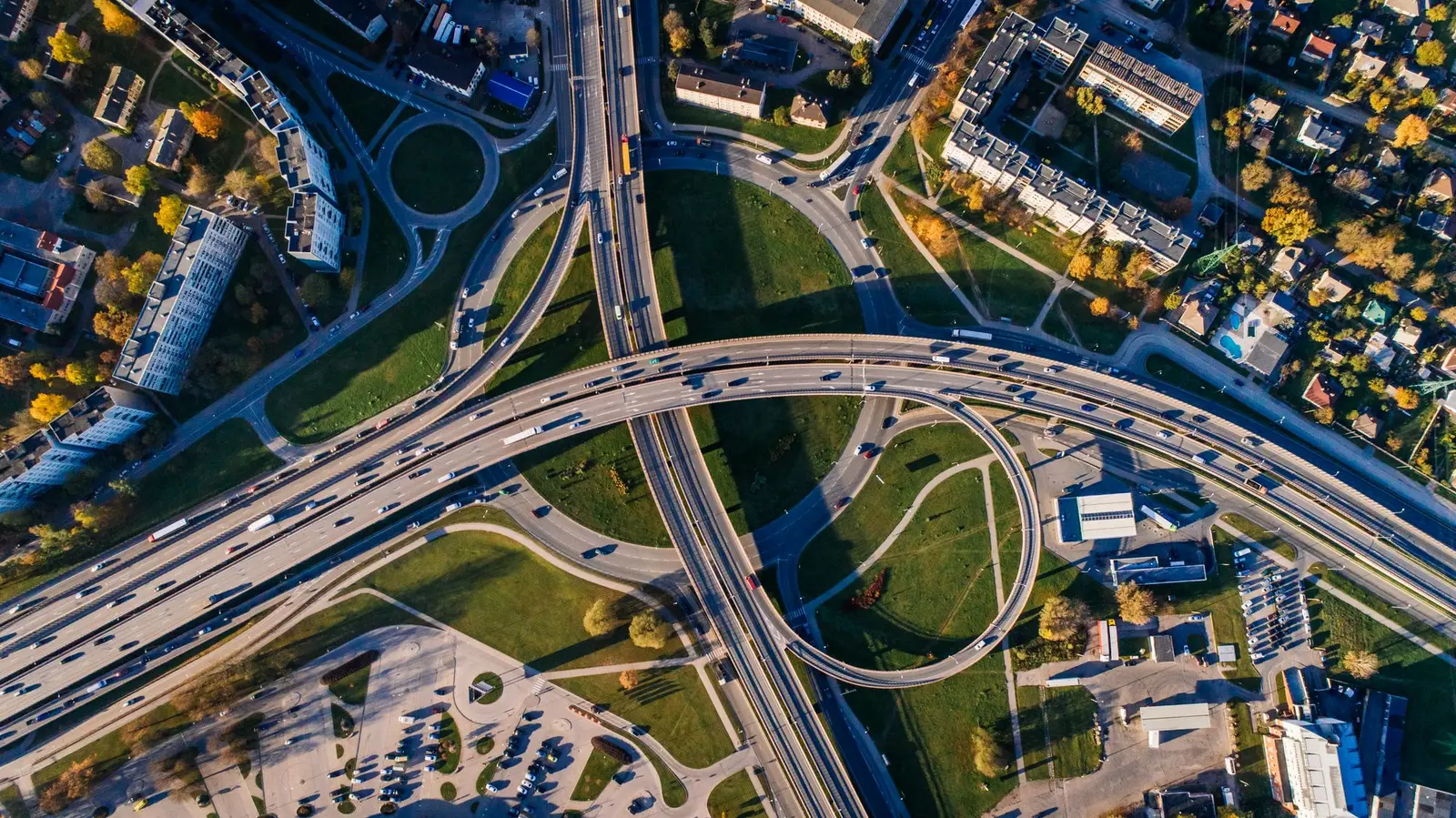 Aerial view of a multi-level road interchange with looping ramps